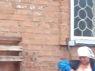 Russian granny shows the brush titties not present